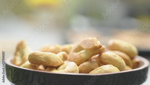 Serving taralli with oregano in a bowl. photo