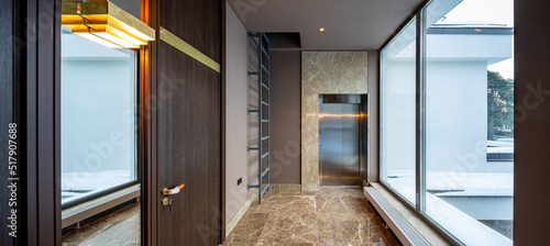 Modern marble interior of entrance hall in luxury residential building