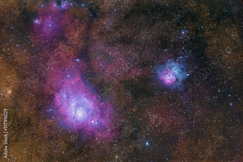 Fototapeta Naklejka Na Ścianę i Meble -  The Lagoon nebula and the Trifid nebula in the center of the milky way