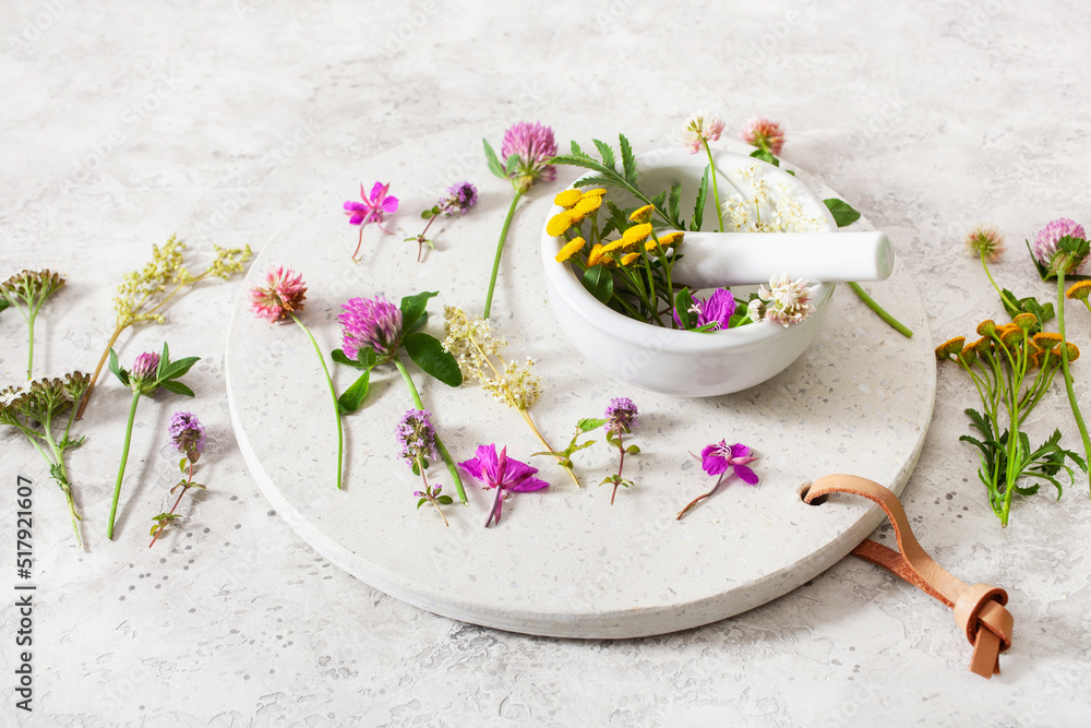 medical flowers herbs in mortar. clover milfoil tansy rosebay. healthy natural lifestyle medical flowers herbs in mortar. clover milfoil tansy rosebay. healthy natural lifestyle