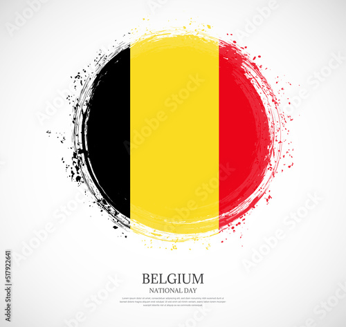 Creative circular grungy shape brush stroke flag of Belgium on a solid background