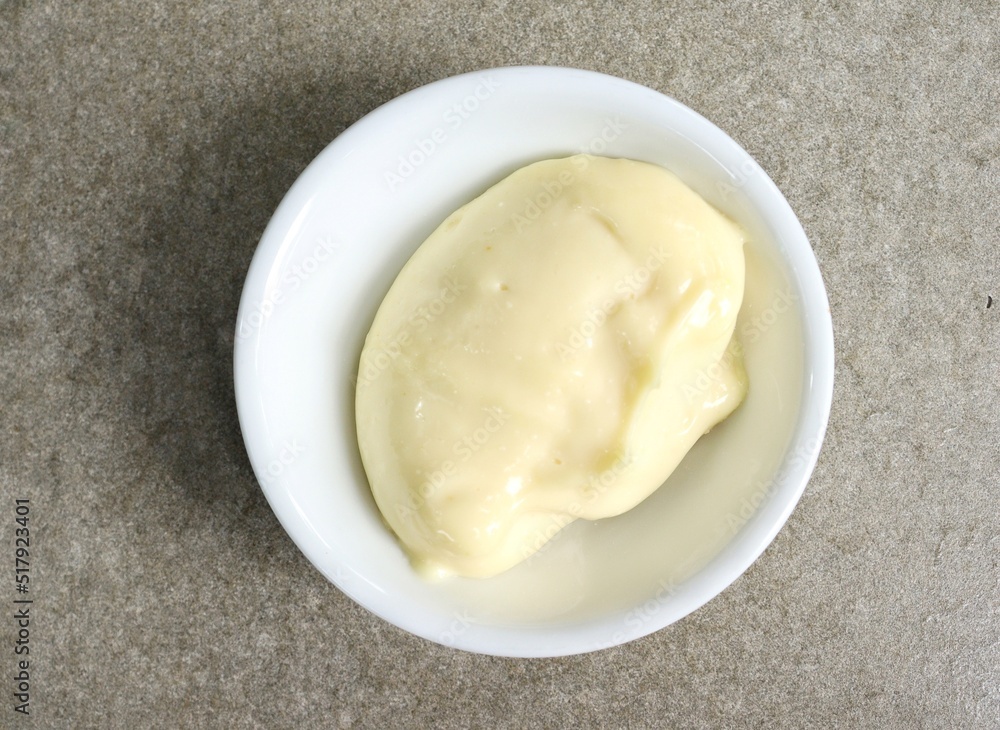 Mayonnaise sauce on gray background Mayonnaise sauce on gray background