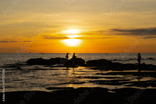 silhouette of a person on the beach-sunset on the beach 