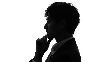 考える男性　シルエット