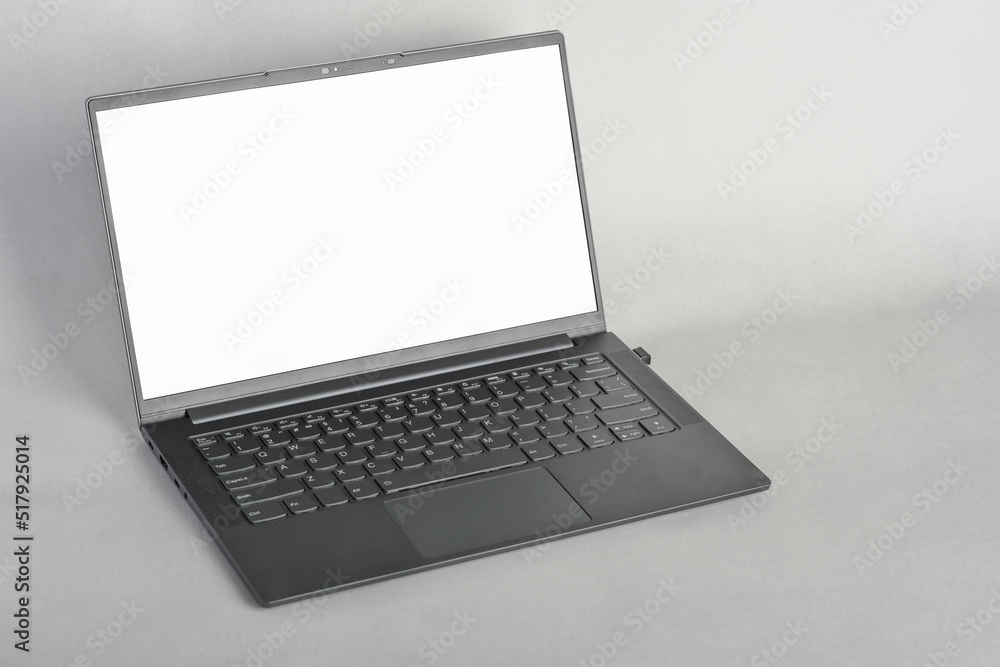 Laptop with blank screen on grey background, mockup template, copy space for picture or advertisment Laptop with blank screen on grey background, mockup template, copy space for picture or advertisment