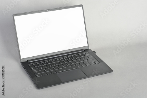 Laptop with blank screen on grey background, mockup template, copy space for picture or advertisment