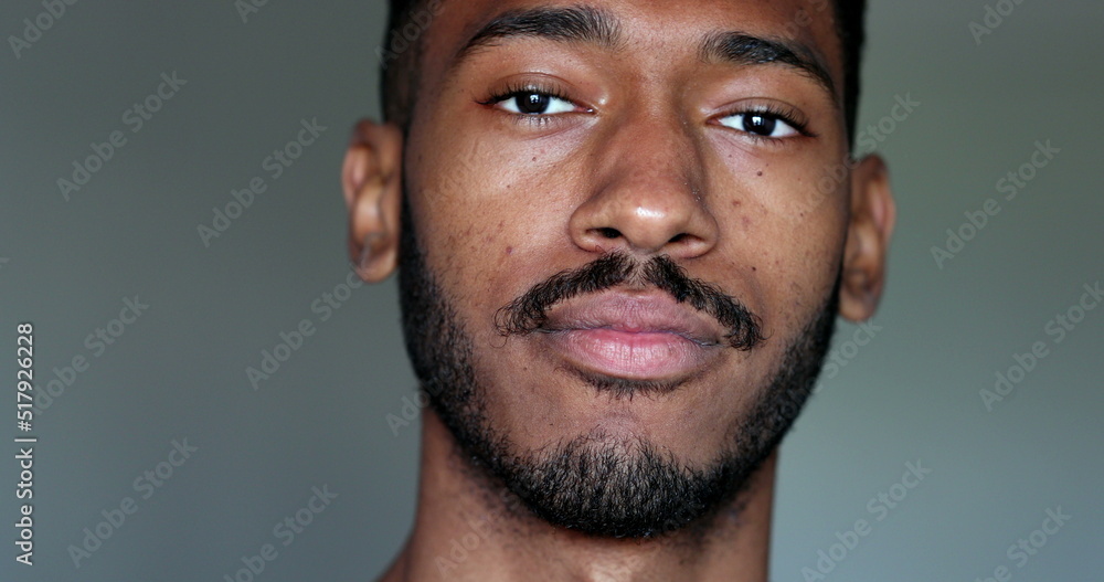 Obraz premium Friendly African american male portrait face close-up