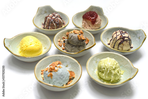Organic ice cream in bowls on white background