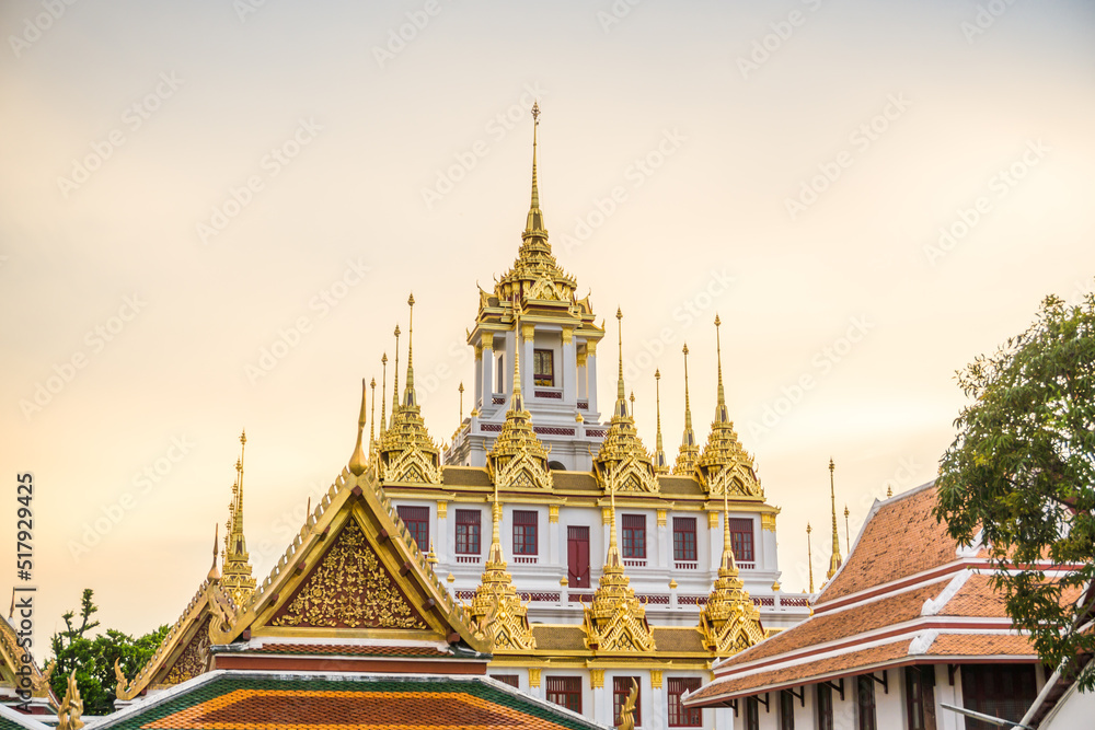 Fototapeta premium Beautiful architect of buddhist templae sunset sky with cloud