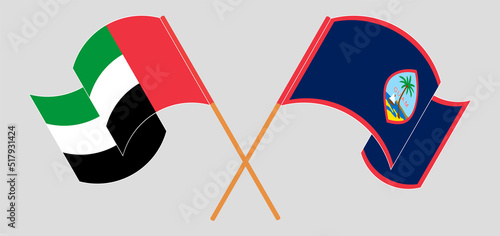 Crossed flags of the United Arab Emirates and Guam. Official colors. Correct proportion