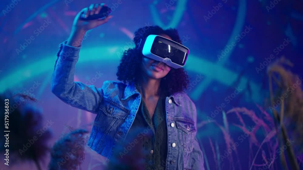 Metaverse digital cyber world technology, woman with virtual reality VR goggles playing augmented reality game, futuristic lifestyle Metaverse digital cyber world technology, woman with virtual reality VR goggles playing augmented reality game, futuristic lifestyle