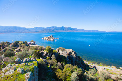 Fototapeta Naklejka Na Ścianę i Meble -  Bafa lake is a peaceful place, ringed by traditional villages such as Kapıkırı full of fisherman boats and ruins of Herakleia