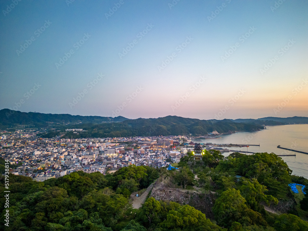 Dawn at castle overlook in small coastal town