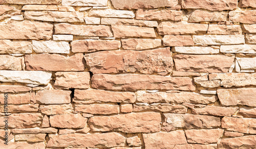 Old brick wall. Background of terracotta stones.