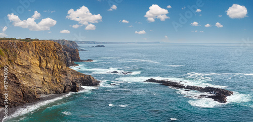 Summer Atlantic ocean coast landscape (near Monte Clerigo beach, Aljezur, Algarve, Portugal). Panorama.