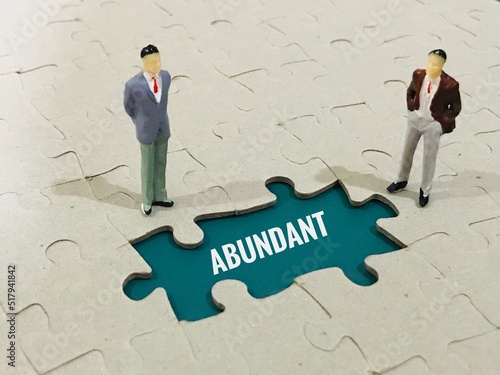 Fotografija business people on puzzle - abundant