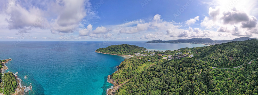 Aerial view drone shot Amazing panorama phuket island. Beautiful island in thailand Amazing High angle view Island seashore with blue sky cloudy sky background. Travel holiday Concept
