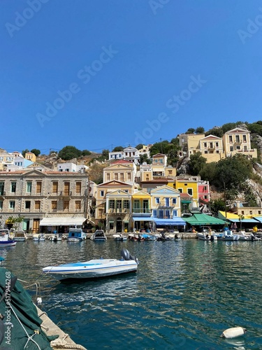 The picturesque port town. Colourful houses. Greece.