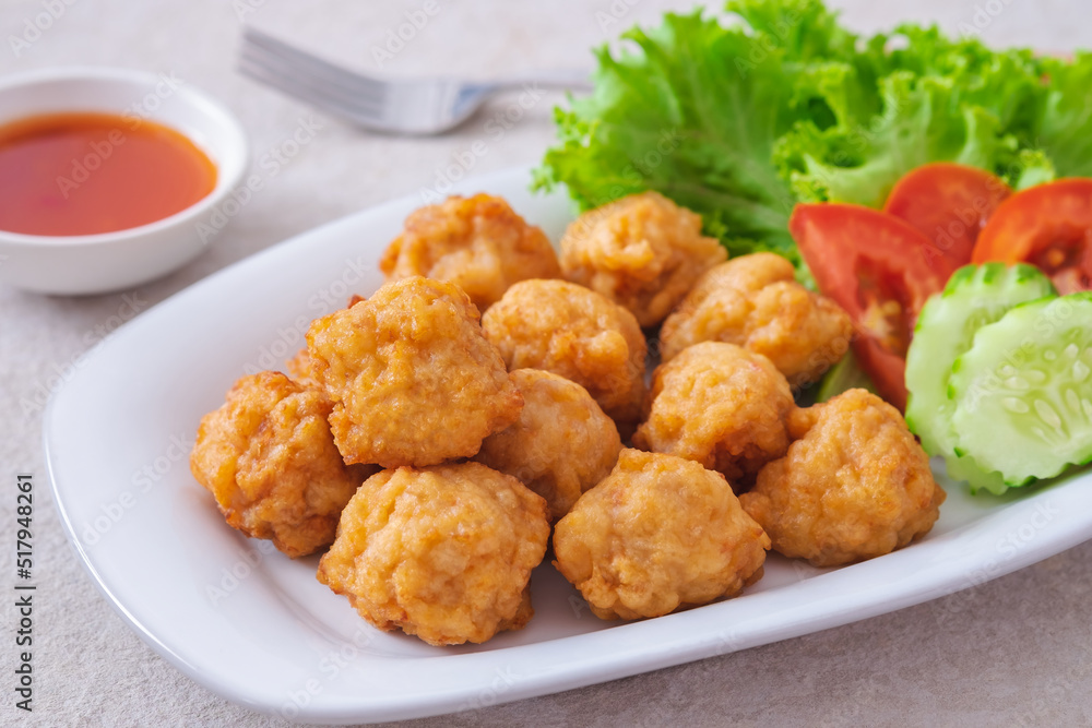 Deep fried shrimp ball and vegetable on plate