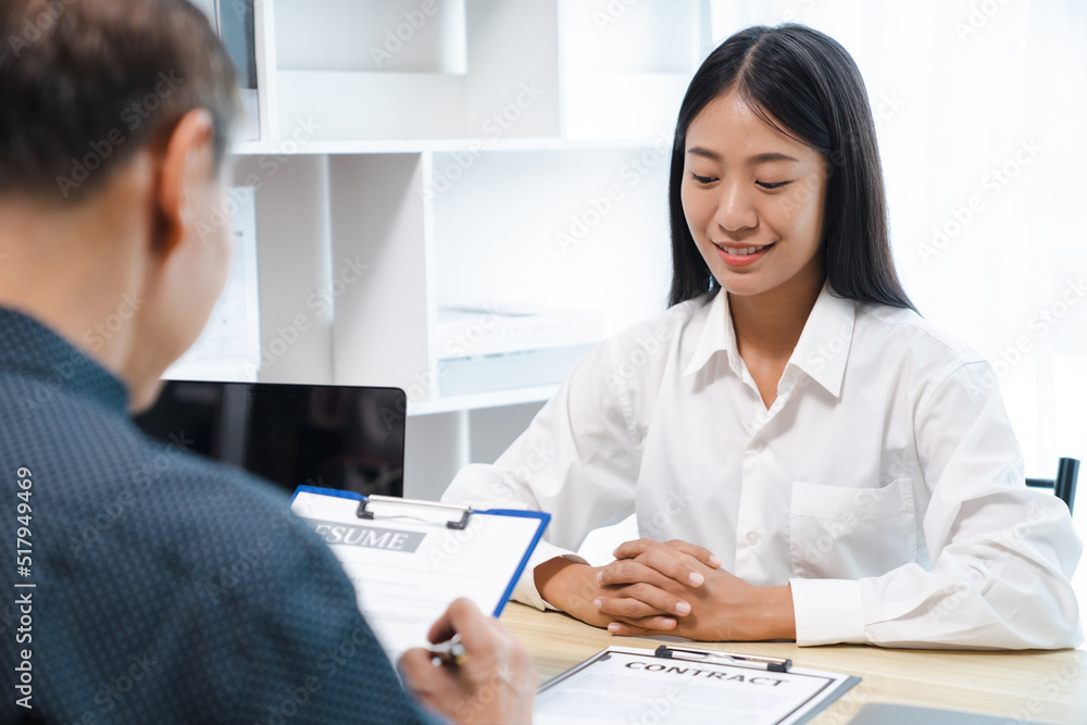 Successful job interview, Recruiter or manager and job candidate with resume in office.. Successful job interview, Recruiter or manager and job candidate with resume in office..