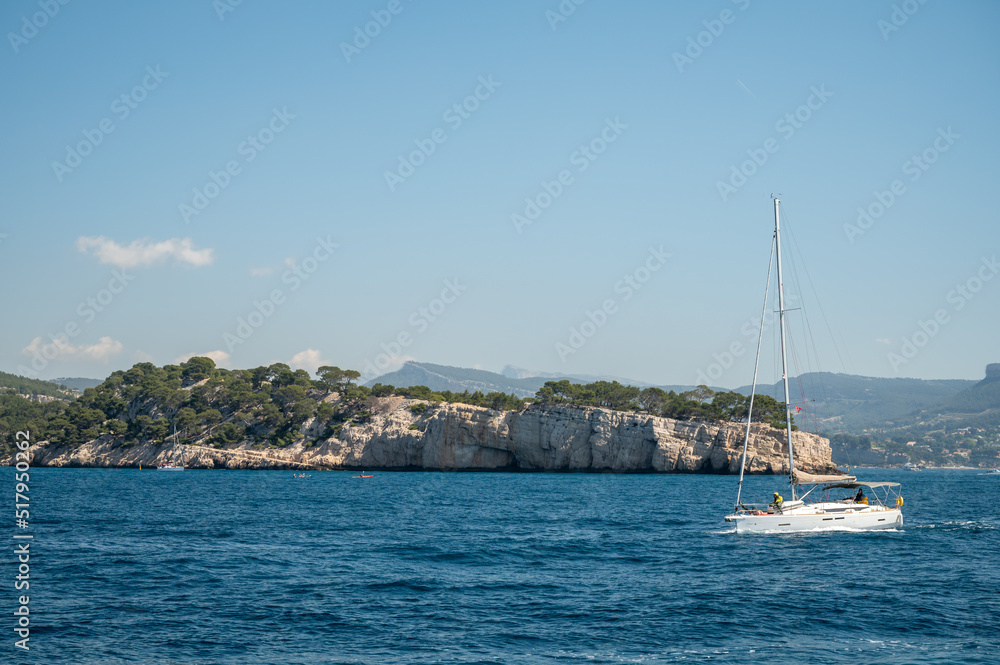Limestone cliffs near Cassis, boat excursion to Calanques national park in Provence, France Limestone cliffs near Cassis, boat excursion to Calanques national park in Provence, France