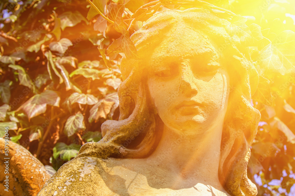 Death. Angel as symbol of pain, fear and end of life. Ancient stone