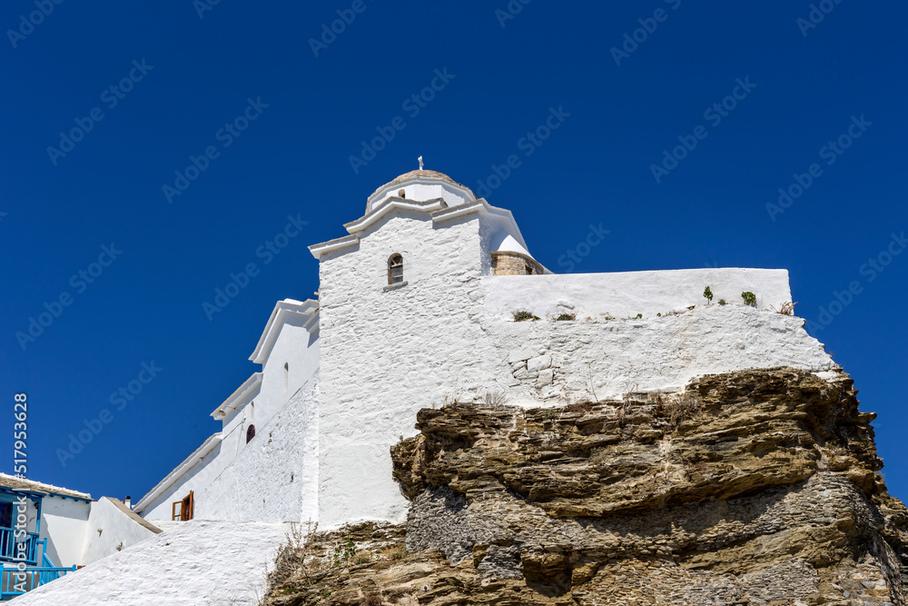 The panoramic view of the white, ancient church (island Skopelos, Northern Sporades, Greece) close-up