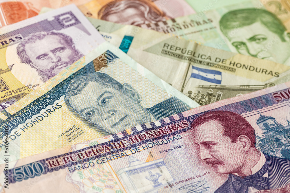 Fototapeta premium Honduras money, paper banknotes, Creative currency business, banking and finance, 500 and 200 Lempiras banknote, Other denominations in the background