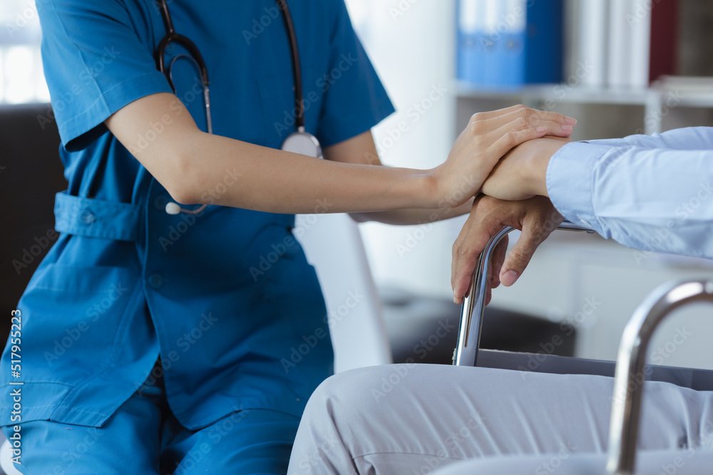 Doctor touches the arm to encourage the patient in the hospital examination room, treating the disease from a medical professional and giving treatment on the spot. Concepts of medical treatment. Doctor touches the arm to encourage the patient in the hospital examination room, treating the disease from a medical professional and giving treatment on the spot. Concepts of medical treatment.