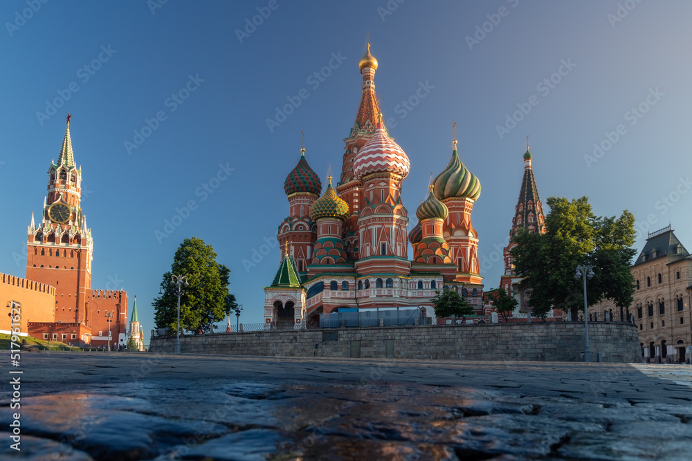 Historic center with St. Basil's Cathedral and the Kremlin Tower at sunrise, Moscow, Russia