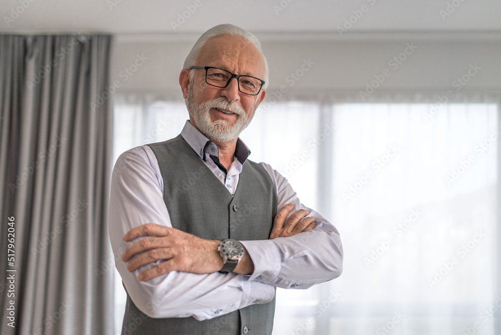 Smart mature businessman with glasses smiling and looking at camera. Smart mature businessman with glasses smiling and looking at camera.