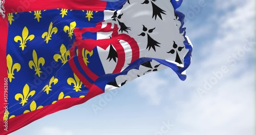 Pays de la Loire flag waving in the wind on a clear day photo