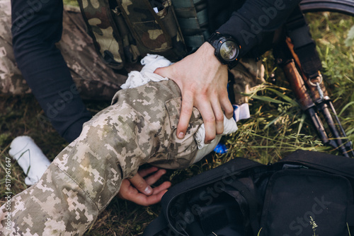 providing first aid for a leg injury