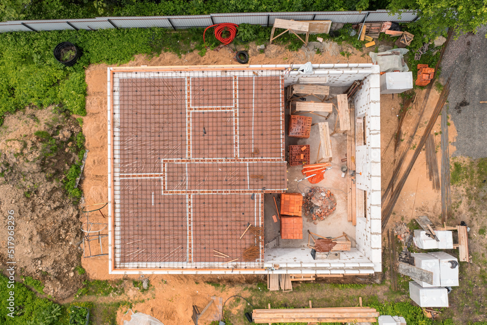 Country house under construction directly above aerial view