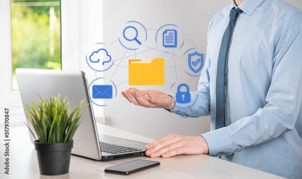 Document Management System DMS .Businessman hold folder and document icon.Software for archiving, searching and managing corporate files and information.Internet Technology Concept.Digital security Document Management System DMS .Businessman hold folder and document icon.Software for archiving, searching and managing corporate files and information.Internet Technology Concept.Digital security