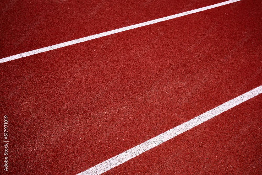 Red background with white stripes. Place in the stadium for athletics and running

