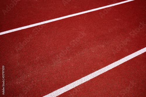 Red background with white stripes. Place in the stadium for athletics and running 