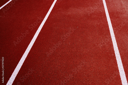 Red background with white stripes. Place in the stadium for athletics and running 