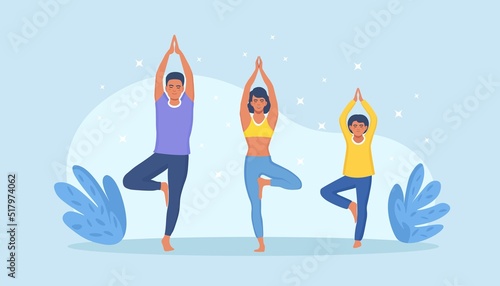Father, mom and daughter doing yoga and stretching. Sport activity with children. Morning exercises at home. Happy family doing fitness, meditation