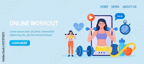 Online sport lesson and fitness course on phone screen. Sportive Woman Training at Home with sport equipment. Cardio, yoga and bodybuilding classes. Trainer conducts strength training using website