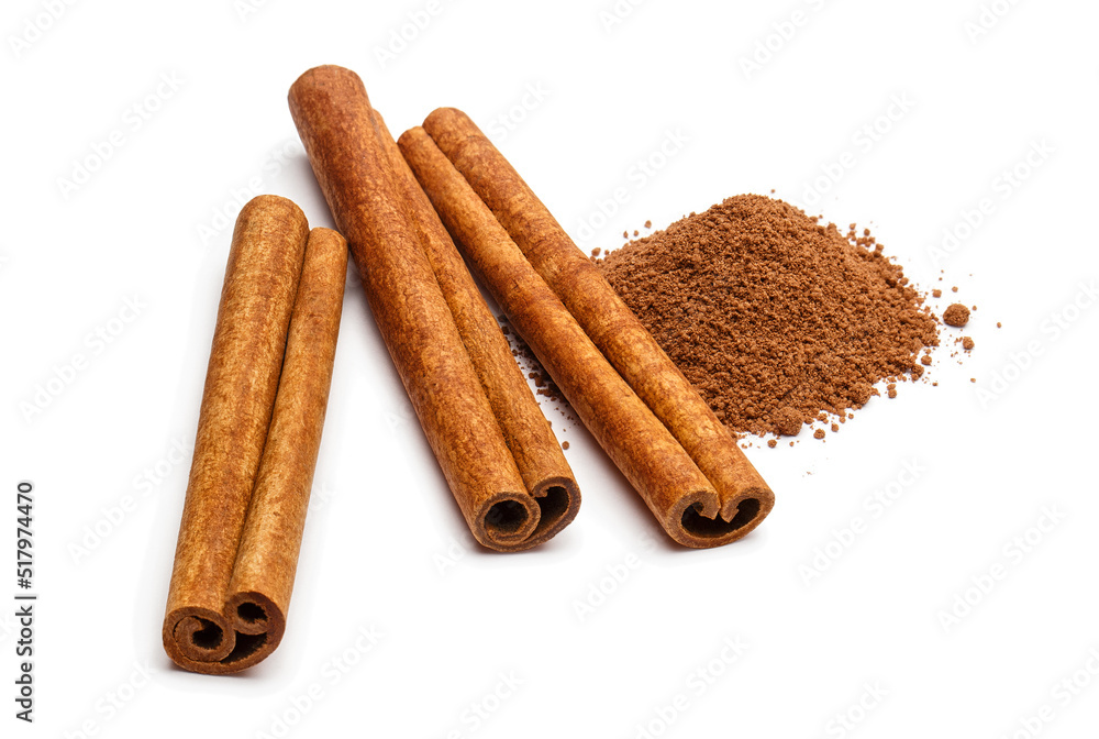 Cinnamon sticks and powder, isolated on white background Cinnamon sticks and powder, isolated on white background
