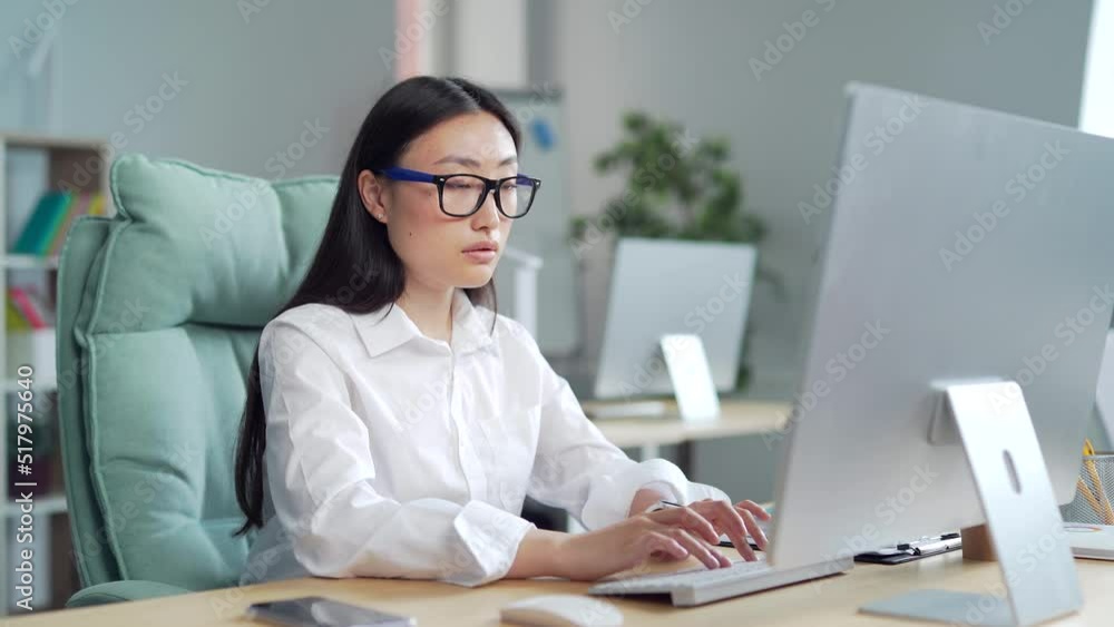 Exhausted, overworked asian office worker sitting in the workplace with severe headache massaging his head. poor vision, sore eyes Tired female employee in pain ache Stress sedentary working computer Exhausted, overworked asian office worker sitting in the workplace with severe headache massaging his head. poor vision, sore eyes Tired female employee in pain ache Stress sedentary working computer