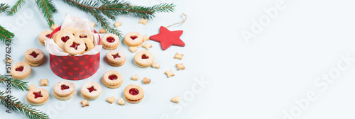 Austrian Linzer Christmas New Year Shortbread Cookies on Blue © Iuliia Metkalova