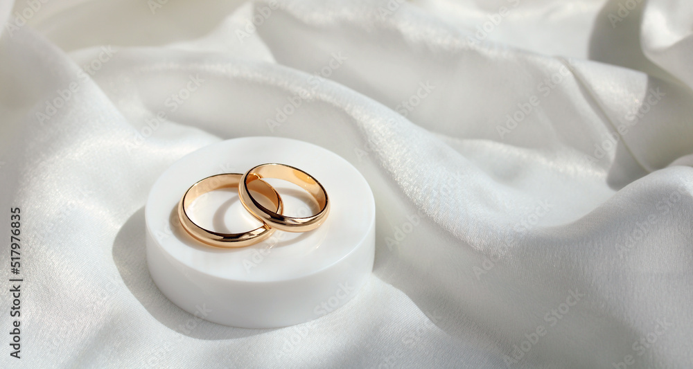 Wedding background with two gold rings. Wedding background with two gold rings.