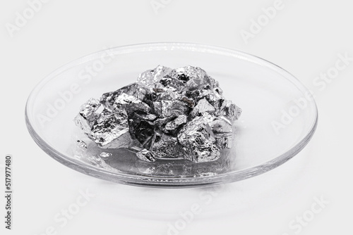 plate with chromium ore, industrial use ore, metallic chemical element, isolated on white background