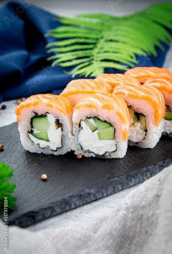 Sushi rolls filadelfia with cucumber. Traditional Japanese cuisine