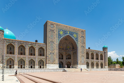 SAMARQAND, UZBEKISTAN - JUNE 09, 2022: Tillya-Kari madrasah decorated with mosaics on Registan Square