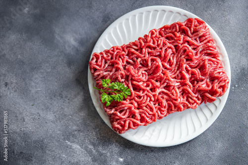 minced meat raw pork, beef, lamb cuisine fresh meal food snack on the table copy space food background rustic 