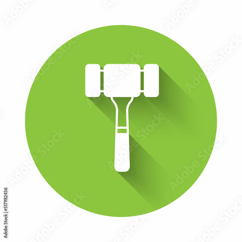 White Auction hammer icon isolated with long shadow background. Gavel - hammer of judge or auctioneer. Bidding process, deal done. Auction bidding. Green circle button. Vector