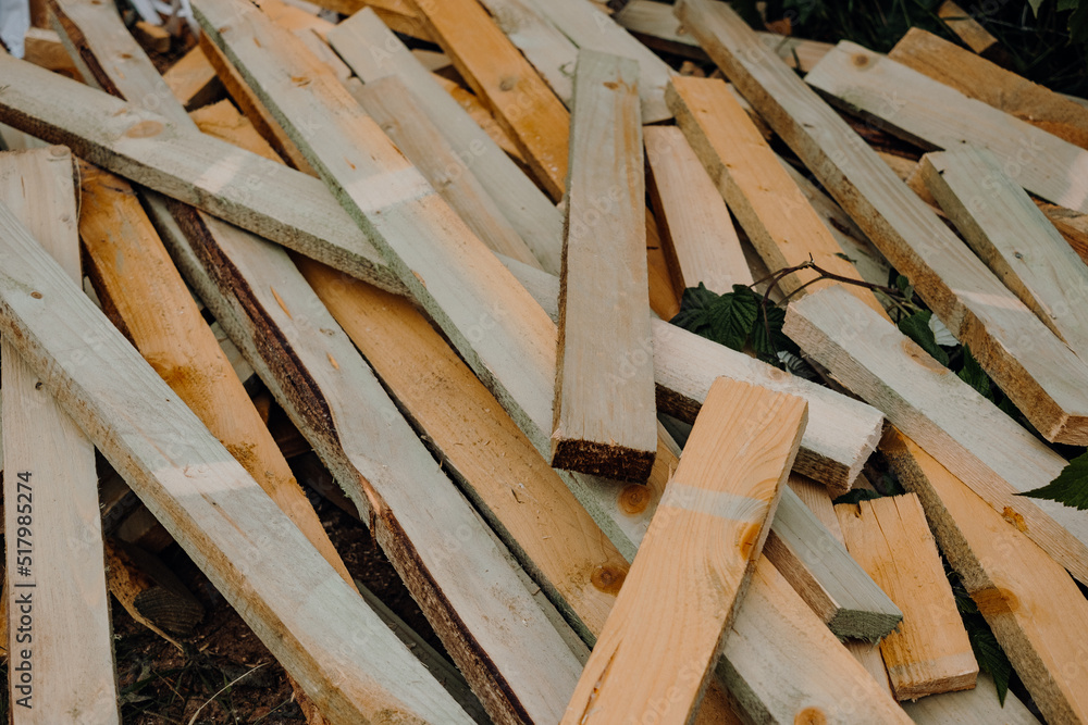 Wood modern and classic tools on newly building house construction with new roof structure , water pipes and scaffolding around building